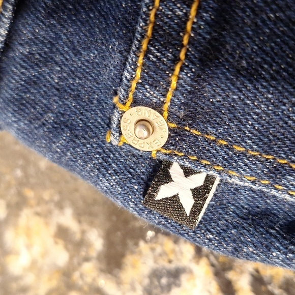 Q  Express solid blue stretch low rise flare jeans size 9/10. EUC - Picture 5 of 6